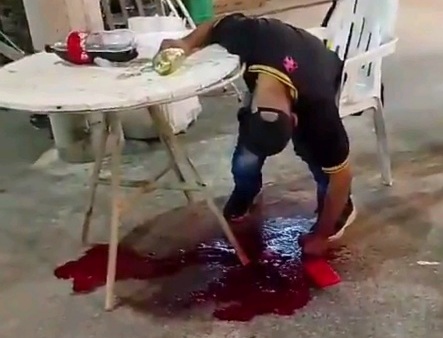 Military police member enjoying his drink executed by traffickers 