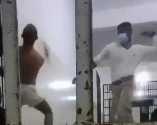 Torturing prisoner in Libyan prison 