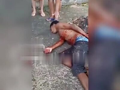 Gang Member Agonizing  After Being Shot In Chest