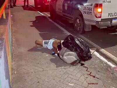 body was discarded on the sidewalk