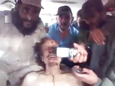 NEW VIDEO OF TORTURING GADDAFI