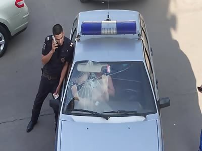 Drunk Woman Breaks Police Car Windshield with Bare Feet