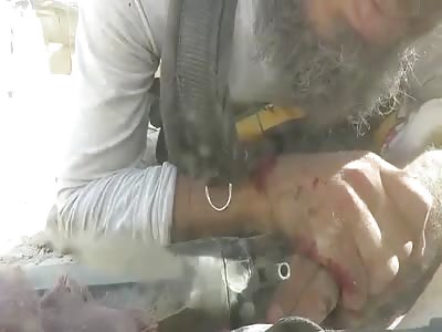 Nusra member films as he dies slowly  