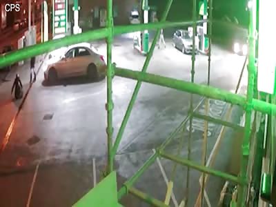CCTV shows man thrown through the air by car at petrol station