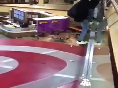 Migrants acting a Fool in a Shopping Mall find out the Hard Way Some Ceilings Don't Hold People