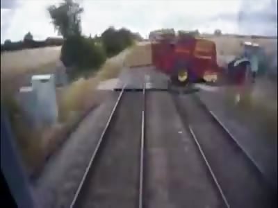 Heart-stopping moment farmer comes inches from colliding with train