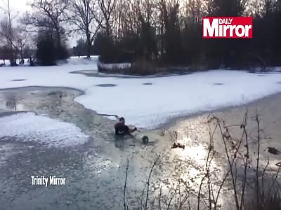 Man jumps into frozen lake to save dog who became trapped in icy waters