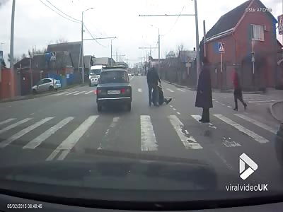 Careless driver rams pedestrian at crossing