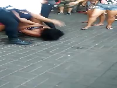 GIRL IS STRIPPED TOPLESS DURING THE STREET BRAWL