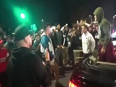 DUDE PICKS A FIGHT WITH A STREET RACERS