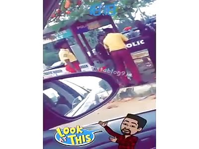 Lastma official punching, butting man for hawking, yesterday, opposite