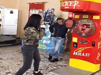 Girl Accidentally Punches The Sh*t Out Of Dude Watching Her Hit A Punc