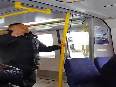 Man really needs that seat on the train more than the two women 