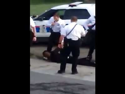 An Ohio police officer kicks a suspects head while he was on the groun