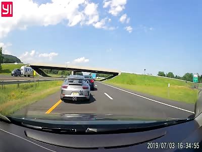 [USA] Semi truck can't stop in time and resorts to the shoulder