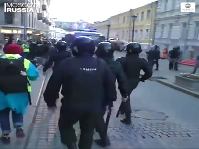 russian police brutality against female protester