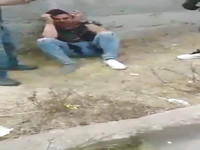 brutally beating thief for stealing cellphone