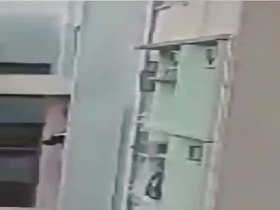 Unconscious Man Getting Shoved Out of a 29th-Floor Window from Yau Ton