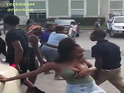 Big black man beating woman then a massive brawl 