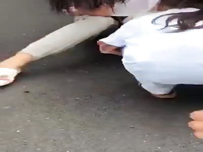 husband punish drunk wife in front of daughter in middle of street 