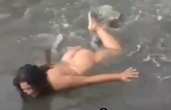 Drugged nude woman swim in pond 