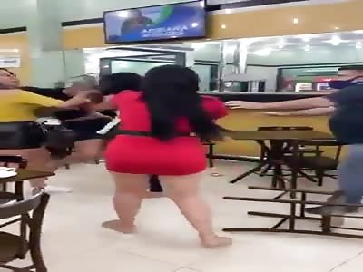 Sexy Latino women fighting in restaurant 
