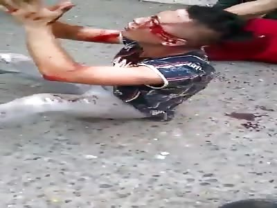Two thieves receive bloody street justice.