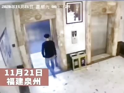 Two Drunk Dudes Fall in Elevator Hole.
