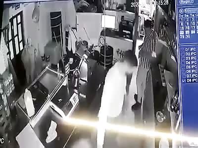 Man working in restaurant gets brutal beating from three men.