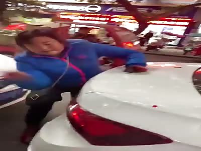 Angry Chinese woman destroy the car of her ex husband