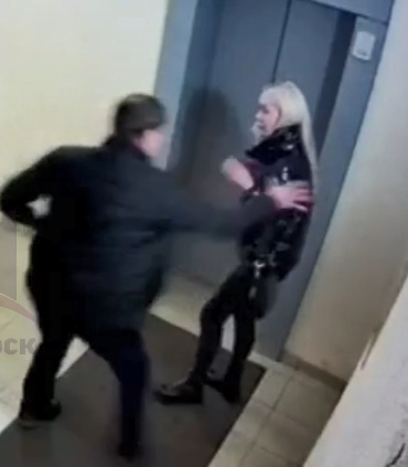 Angry husband abusing his wife in the elevator 
