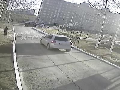 Little boy on bicycle crushed by a car
