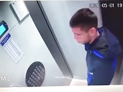 Angry Russian beating his neighbor in the elevator 