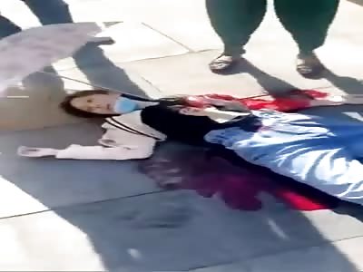 Chinese girl stabbed to death in street 