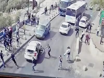 Israeli driver tried to crash Palestinians nearly stoned to death 