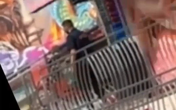 Fairground worker has a shite day.