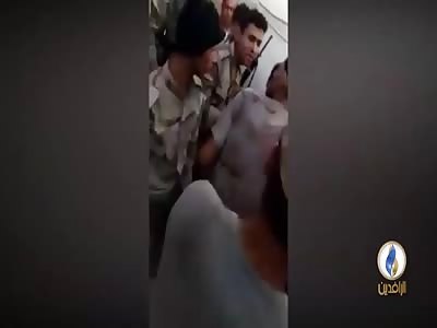 Iraq|i forces torturing and executing a man in Mosul. 