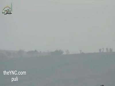 Victory Army Destroying a tank with a Tau missile in front of Rabda of Hama field