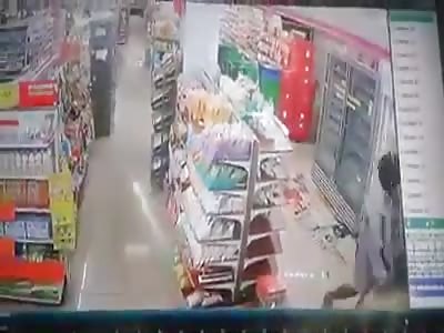 Woman attacks an employee with an ax