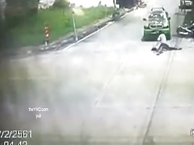 security cameras shows truck passing over motorcycle driver