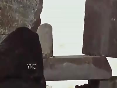 Video shows long range shot at an Assad fighter by rebel sniper in Western Aleppo this week.