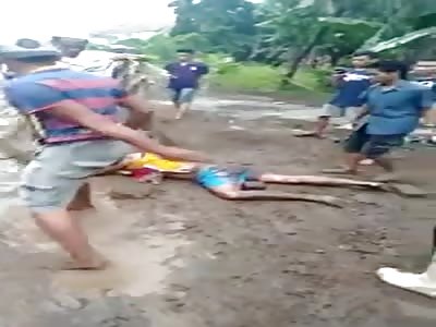 Thief is Beaten Mercilessly by Men in a Village as Villagers Watch 