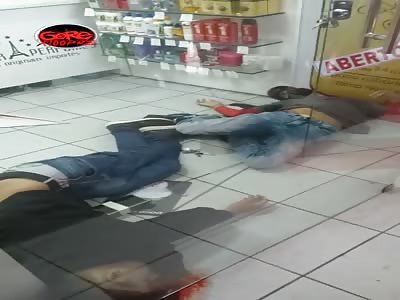a thief killed and another wounded inside the store in attempted robbe