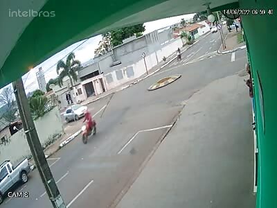 cctv motorcyclist is hit by car