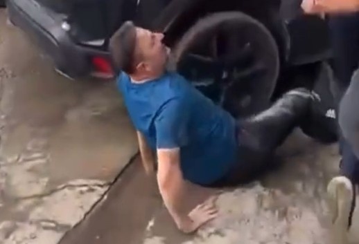 ROAD RAGE: MAN BEING RUN OVER