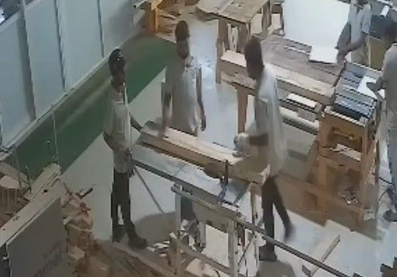 CARPENTER CUT HIS HAND IN THE BAND SAW