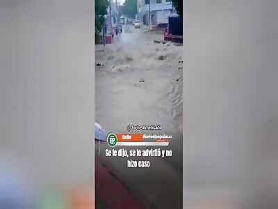 HE WAS SWEPT AWAY BY THE DOWNPOUR