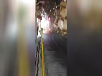 Truck fatally skids smashing slums