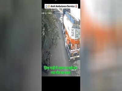 MAN BEING CRUSHED BY TRUCK