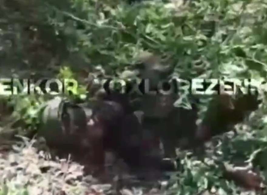 Killing a Ukrainian POW for money.